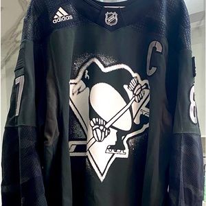 SOLD. Authentic Sidney Crosby Game Issue Salute to the Military warmup.